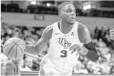  ?? STAFF FILE PHOTO ?? UCF forward A.J. Davis went 3 of 3 from beyond the arc to score a career-high 26 points against USF.
