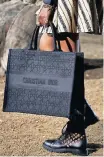  ?? ?? THE school bag of choice for rich kids everywhere – the Christian Dior book tote from Spring/Summer 2020.