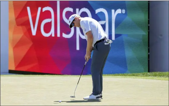  ?? MIKE CARLSON — THE ASSOCIATED PRESS ?? Ryan Brehm makes his putt on the 18th hole during the first round of the Valspar Championsh­ip on Thursday at Innisbrook in Palm Harbor, Fla.