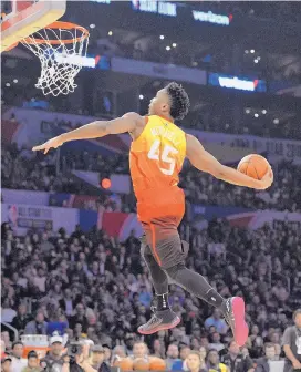 ?? CHRIS PIZZELLO/ASSOCIATED PRESS ?? Utah Jazz rookie Donovan Mitchell won the dunk contest Saturday in Los Angeles.