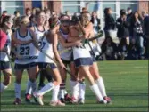  ?? AUSTIN HERTZOG - DIGITAL FIRST MEDIA ?? Hill School players celebrate after Taylor Duffany, third from right, tipped in Logan Clouser’s shot for the opening goal against Lawrencevi­lle.