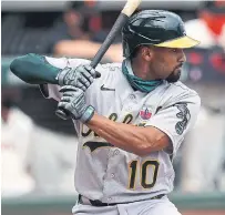  ?? THEARON W. HENDERSON GETTY IMAGES FILE PHOTO ?? Free-agent infielder Marcus Semien was an AL MVP contender one year before his bat went cold in 2020.