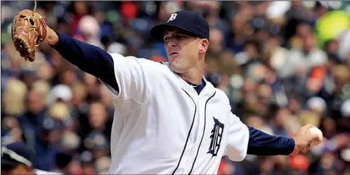  ?? AP/CARLOS OSORIO ?? Former Arkansas Razorbacks pitcher Drew Smyly takes a 1-0 record and a 1.61 ERA into the sixth start of his rookie season against the Mariners in Seattle tonight. Smyly, who is from Little Rock, was praised by Detroit catcher Alex Avila for his...