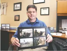  ?? STAFF PHOTO BY ERIN O. SMITH / ?? Chuck Ayars, an Iraq war veteran, poses Oct. 31 for a portrait in his office at the Chattanoog­a Vet Center holding photos of himself. In November 2004, Ayars was injured when a member of al-Qaeda detonated a bomb in a car while he and others in his...