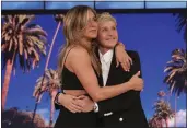  ?? MICHAEL ROZMAN — THE ASSOCIATED PRESS ?? Talk show host Ellen DeGeneres, right, is embraced by Jennifer Aniston during the final taping of “The Ellen DeGeneres Show” at the Warner Bros. lot in Burbank.