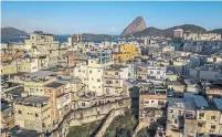  ?? DADO GALDIERI/BLOOMBERG NEWS ?? A view of homes in Rio de Janeiro, Brazil. Banks use U.S. dollars for a lot of lending in emerging markets such as Brazil.