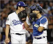  ?? MATT SLOCUM / AP FILE ?? Dodgers catcher Austin Barnes can still talk to pitcher Kenta Maeda from the infield grass or behind the plate after a pitcher comes home to cover a play.