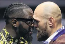  ?? PHOTO: GETTY IMAGES ?? Faceoff . . . Deontay Wilder (left) and Tyson Fury butt heads during a press conference to promote next month’s fight.