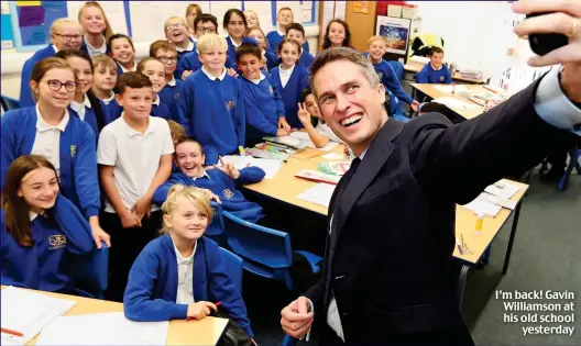  ??  ?? I’m back! Gavin Williamson at his old school yesterday