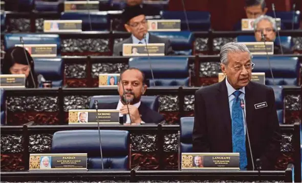  ?? BERNAMA PIC ?? Prime Minister Tun Dr Mahathir Mohamad answering questions at the Dewan Rakyat yesterday.