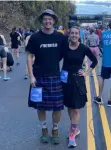  ?? Dani Marsh ?? Joshua Line, left and Dani Marsh honor their cousin, Michael Bolger, by running the EQT Pittsburgh 10 Miler in kilts.