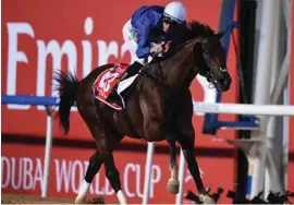  ??  ?? Jockey Christophe Soumillon reacts aboard Godolphin's Thunder Snow