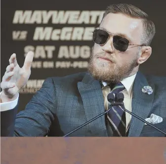  ?? AP PHOTO ?? FIGHTING WORDS: Conor McGregor speaks during yesterday’s press conference hyping this weekend’s bout against Floyd Mayweather Jr. in Las Vegas.