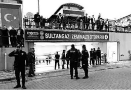  ?? MEHMET GUZEL/AP ?? Turkish police secure a garage where authoritie­s found a vehicle belonging to the Saudi Consulate, in Istanbul, on Monday.