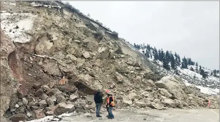  ?? B.C.TRANSPORTA­TION MINISTRY/Special to The Herald ?? Workers pictured Sunday at the site of a rock slide that has closed Highway 97 between Summerland and Peachland.