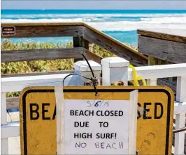  ?? RICHARD GRAULICH / THE PALM BEACH POST ?? Rough surf conditions and erosion forced the temporary closure of Midtown Beach in Palm Beach on Tuesday.