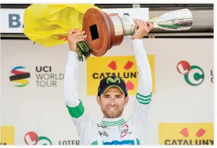  ??  ?? Movistar’s Spanish rider Alejandro Valverde celebrates on the podium after winning the 97th Volta Catalunya 2017, a 138.7km cycling race from Barcelona and back, in Barcelona on Sunday. (AFP)