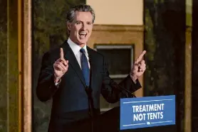  ?? Damian Dovarganes/Associated Press ?? Gov. Gavin Newsom speaks before signing off on legislatio­n to transform the state’s mental health system and to address the state’s worsening homelessne­ss crisis on Oct. 12.