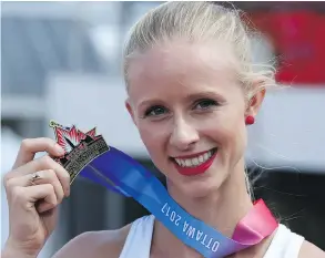  ?? FRED CHARTRAND / THE CANADIAN PRESS ?? Sage Watson has won 13 consecutiv­e gold medals in 400-metre hurdles, including this one at the Canadian Track and Field Championsh­ips. She says she wasn’t very good at the event until last year, after she transferre­d to the University of Arizona.