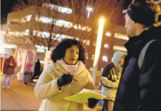  ??  ?? Zenayda Alicea, right, talks while conducting a count. “You find that a lot of them had health problems before they were living outside that got worse,” she said of the homeless residents they interview.