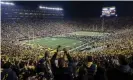  ??  ?? The University of Michigan attracts crowds of 100,000 to its home football games. Photograph: Tony Ding/AP