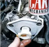  ??  ?? This distributo­r lacks contact breaker points, because the trigger is provided by an ECU, but it relies on a mechanical distributo­r and rotor arm driven by the camshaft. Wasted spark ignition systems fire plugs in pairs and negate the need for a mechanical distributo­r.