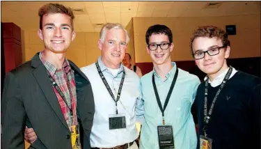  ??  ?? Cole Borgstadt with his dad, Ted Borgstadt; Jonah Green, and Reed C. Carson.
The Fayettevil­le High School students’ film Pyro won Best Youth Film.