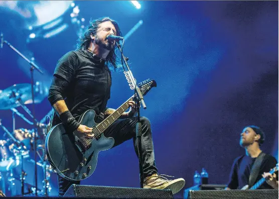  ?? AMY HARRIS/INVISION/THE ASSOCIATED PRESS ?? Dave Grohl leads the hard-rocking Foo Fighters into Calgary for a must-see show at the Scotiabank Saddledome Sept. 6.