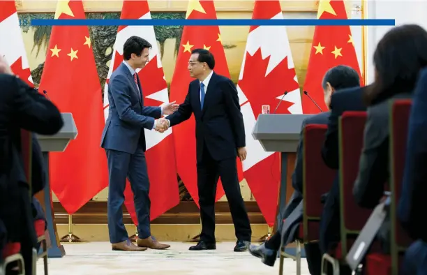  ?? Adam Scotti photo ?? Prime Minister Trudeau meets with Premier Li at the Great Hall of the People in Beijing. December 4, 2017.