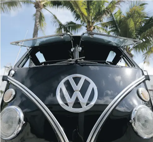  ?? JOE RAEDLE / GETTY IMAGES FILES ?? A 1955 Volkswagen Oval-Window bus at Florida garage that specialize­s in restoring VW vehicles. The popularity of #vanlife lifestyle posts on Instagram has apparently driven up the price of vintage vans converted for living in.