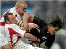  ??  ?? Left, Former England hooker Steve Thompson, who has early onset dementia, tackles All Black Rodney So’oialo at Twickenham in 2005.
Right, Simon Hickey falls to the ground after a high shot from Otago’s Sio Tomkinson.