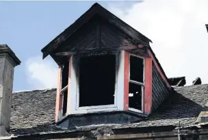  ??  ?? Smoke damage Flames could be seen coming from a window in the flat