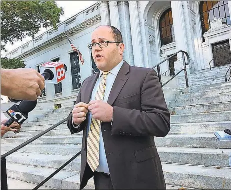  ?? CTNewsJunk­ie.com file photo ?? Brian Festa speaks to the media outside the state Supreme Court in Hartford last year.