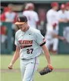  ?? BRYAN TERRY/THE OKLAHOMAN ?? Oklahoma State's Justin Campbell (27) celebrates after getting the final out of the fifth inning on May 1 at OU.