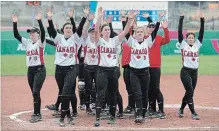  ??  ?? Canada’s women’s softball team salutes the crowd after its preliminar­y win over Mexico Thursday.