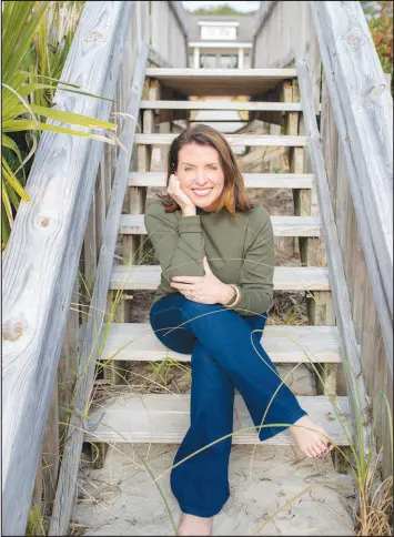  ?? ALLISON DUFF / ALLI D. PHOTOGRAPH­Y ?? After years of heavy drinking to ease her anxiety, Karla Adkins nearly died from liver failure 10 years ago. She now works as a coach to help people change their relationsh­ip with alcohol and published a book about her health ordeal.