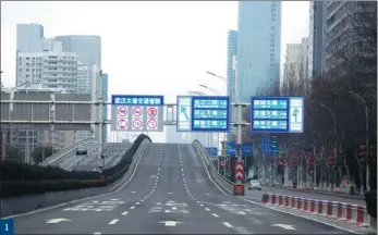  ?? ZHU XINGXIN / CHINA DAILY ?? 1
'$ Wuhan Avenue, a major expressway crossing the city, is deserted on Feb 7.