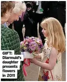  ?? ?? GIFT: Diarmuid’s daughter presents flowers in 2011