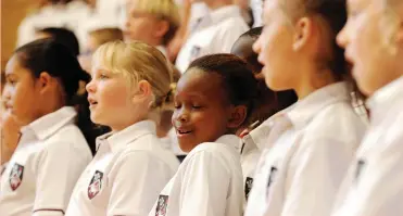  ?? PICTURE: TRACEY ADAMS/AFRICAN NEWS AGENCY (ANA) ?? MILESTONE: Sisipho Ndabambi, 8, and other members of the Fish Hoek Foundation Phase Choir in action. Yesterday marked the 100th birthday of Fish Hoek and the sale of the first plots, laying the foundation­s for the town.