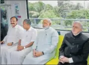  ?? PTI ?? (From left) Union minister M Venkaiah Naidu, Kerala CM Pinarayi Vijayan, PM Narendra Modi and governor P Sathasivam take a ride in the newly launched Kochi Metro in Kerala on Saturday.