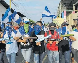  ?? AFP ?? Marcha. Contra Ortega en Niquinohom­o, cerca de Managua.