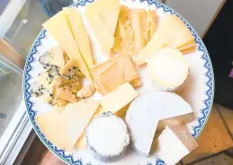  ??  ?? An array cheeses from Goot Essa, an Amish farmstead cheesemake­r in Central Pennsylvan­ia, include, clockwise from far left: Der Edel Bleu Kase; Der Alpen Kase, a cow’s milk Alpine-style cheese; Der Mutterscha­f Kase, a semi-soft sheep’s milk Pecorino-style; Butta Schaf Kase, hard sheep’s milk Pecorino-style, Felsa Yeh, a firm sheep’s milk Manchego-style; Emanuel VomTal Kase, a bloomy rind sheep cheese; Der Weichen Gehl, a cow’s milk Camembert; Marn Vom Berge Kase, an ash-ripened goat cheese.