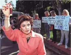  ?? VINCE BUCCI/ AFP/GETTY IMAGES ?? Allred holds a vial of blood in protest of a fundraisin­g event at O.J. Simpson’s estate in 1996. She represente­d the family of Nicole Brown Simpson.