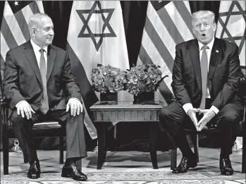  ?? EVAN VUCCI/AP ?? President Donald Trump meets Israeli Prime Minister Benjamin Netanyahu in New York in 2017.