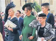  ??  ?? Pippa, centre, during Princess Eugenie’s wedding