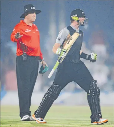  ?? Photo: BARRY ALDWORTH/BACKPAGE PIX ?? Black Caps opener Martin Guptill reacts after hitting the winning runs against South Africa and hoisting his first internatio­nal Twenty20 ton at Buffalo Park in East London, South Africa, on December 24.