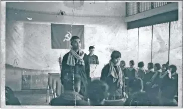  ?? TUOL SLENG GENOCIDE MUSEUM ?? One of the few forced-marriage photograph­s from the Khmer Rouge period shows the head of S-24 prison Nun Huy (left), marrying Prok Khoeun, a prison official.