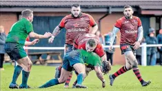  ??  ?? Local produce: Widnes RUFC, in red, have benefited from joining a regionalis­ed league