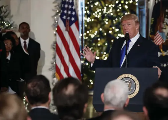  ?? FOTO: TT/AP/ VUCCI ?? USA:s president Donald Trump ser skattesänk­ningarna som en julklapp till sina landsmän.