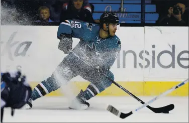  ?? PHOTOS BY NHAT V. MEYER — STAFF PHOTOGRAPH­ER ?? San Jose Sharks’ Patrick Marleau controls the puck against the Winnipeg Jets at the SAP Center in San Jose in January 2017. Tonight in Las Vegas, Marleau is set to pass hockey legend Gordie Howe on the NHL’s most-games-played list.